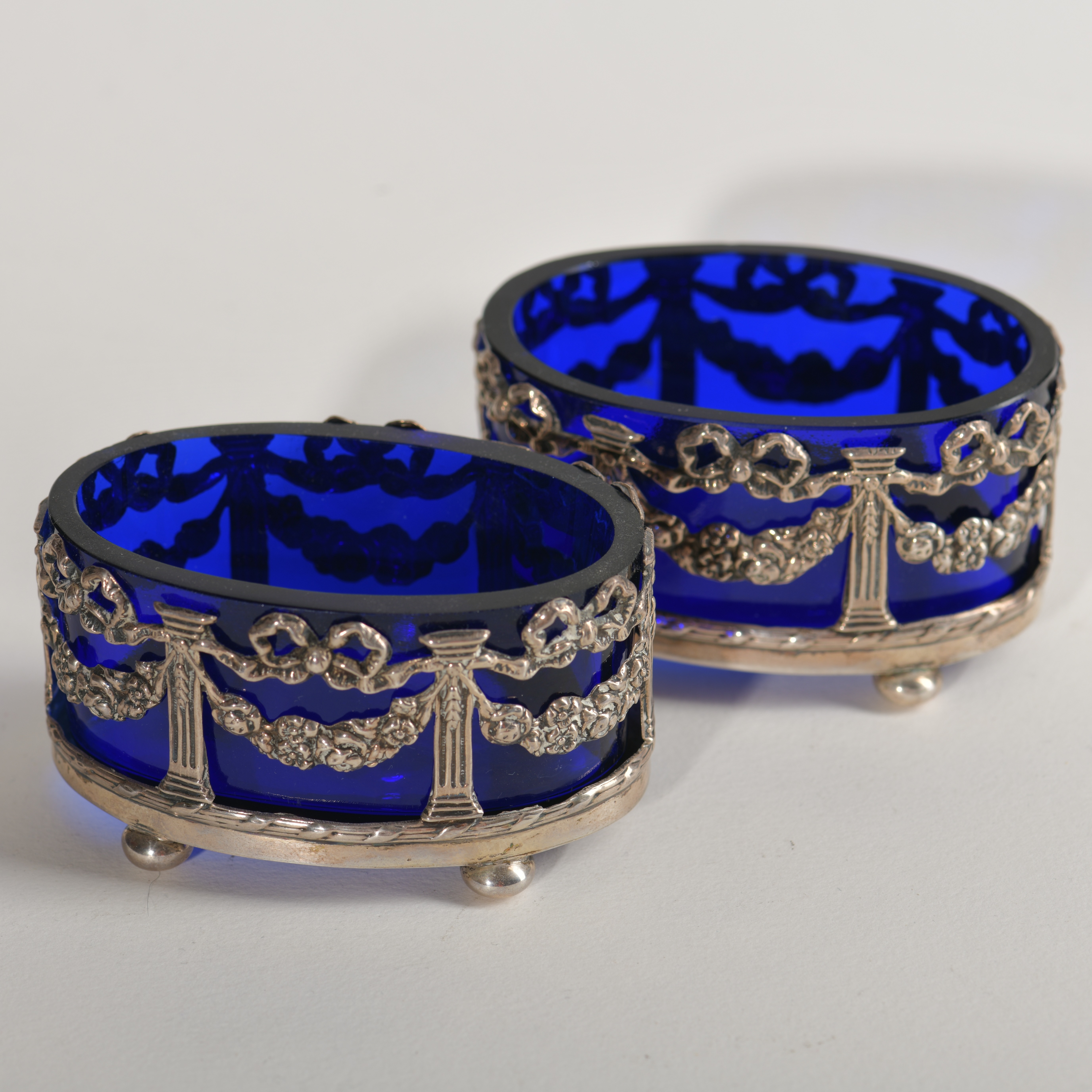 Pair of English Sterling Silver and Bristol Blue Glass Salt Cellars