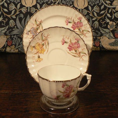 Pretty floral trio with gilt edges