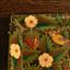 Detail of a hummingbird and a strawberry