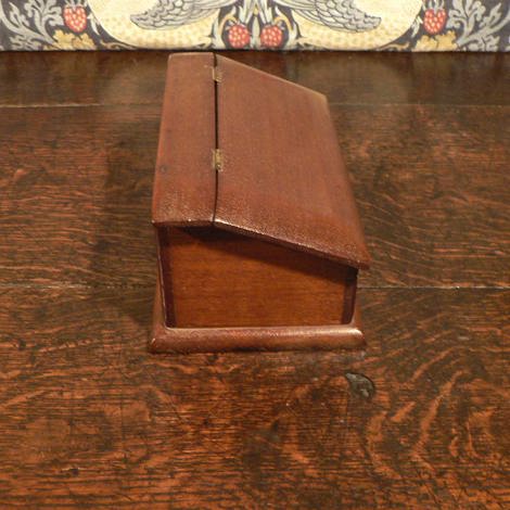 Side view - sloping top